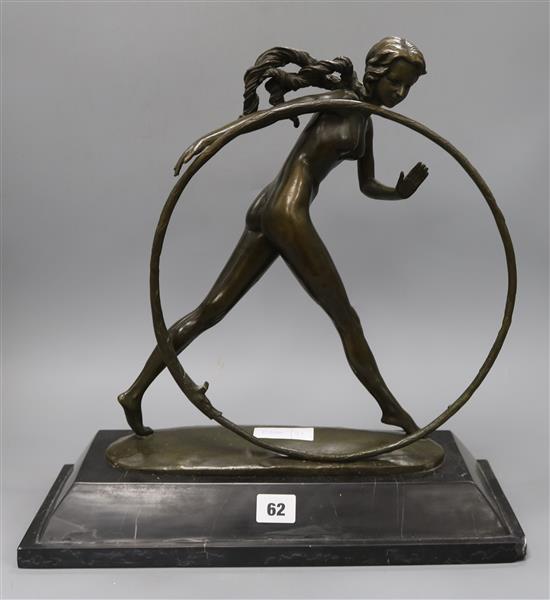 A bronze figure of a hoop girl, on marble base height approx. 41cm